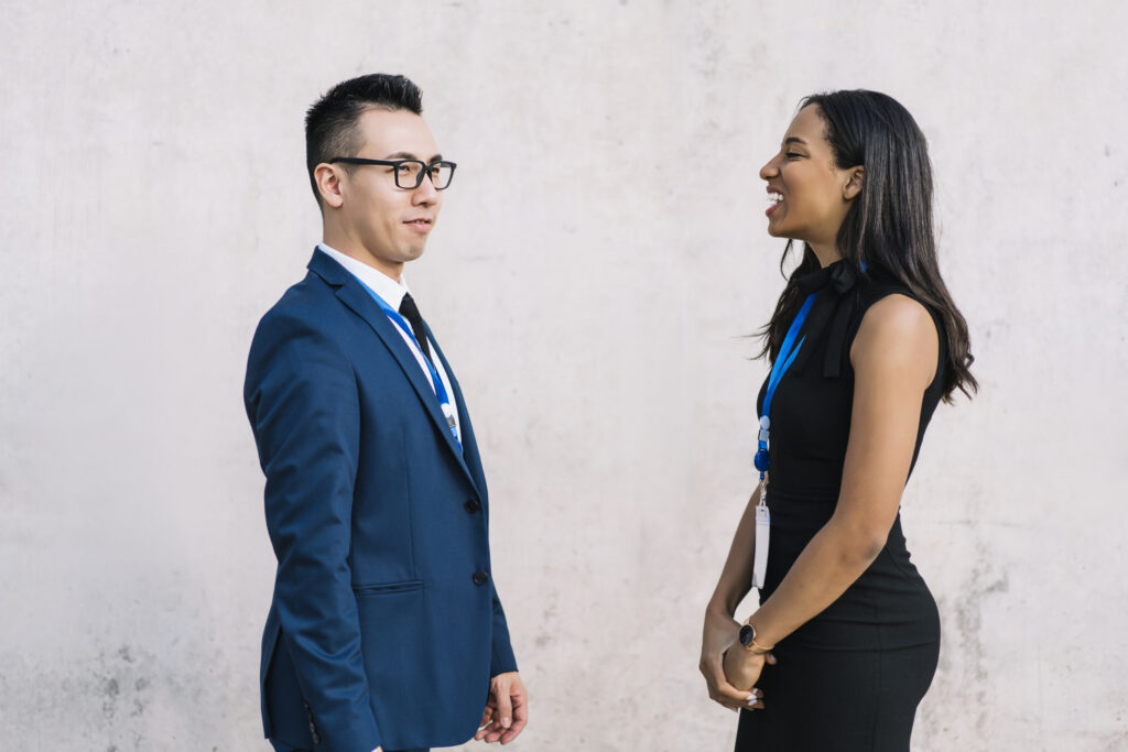 Two direct sales professionals are having an awkward conversation