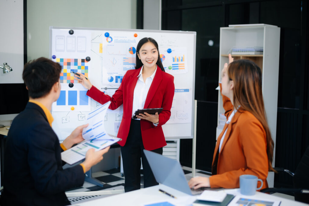 A market research analyst collaborating with other people